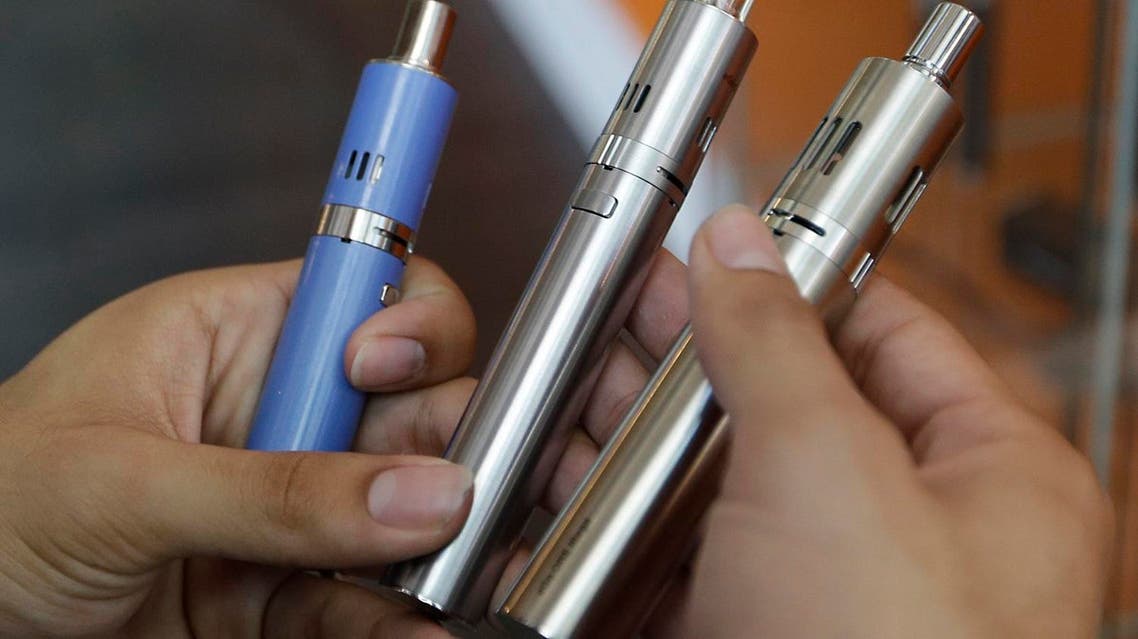 Research says that around 2.8 million people in the UK use e-cigarettes and have become the most popular smoking cessation aid in the country. (File Photo: AP)