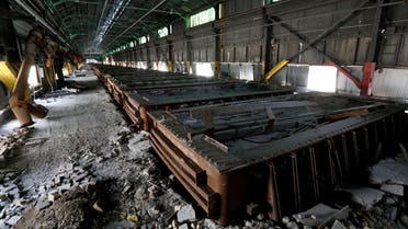 This Thursday, Sept. 8, 2016, photo shows the pot line that housed the reduction cells for the former Ormet plant, at the site in Hannibal, Ohio. For decades, many workers in the area found work at the aluminum plant...union jobs, with good pay and generous benefits. But due to stiff price competition from China, the plant closed in 2014. (AP)