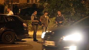 Police officers stand guard as they take part in a raid in Boussy-Saint-Antoine, east of Paris, Thursday, Sept. 8, 2016 (File Photo: AP/Thibault Camus)