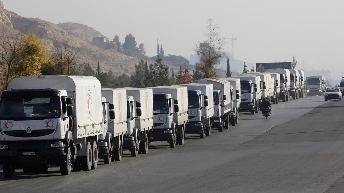 The convoys, each of around 20 trucks carrying mostly food and flour, set off from the Turkish border town of Cilvegozu. (AP)