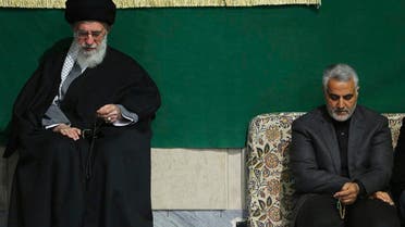  In Friday, March 27, 2015 file this photo released by an official website of the office of the Iranian supreme leader, commander of Iran's Quds Force, Qassem Soleimani, right, sits next to the Supreme Leader Ayatollah Ali Khamenei while attending a religious ceremony in a mosque at his residence in Tehran, Iran. The tide of global rage against the Islamic State group lends greater urgency to ending the jihadis’ ability to operate at will from a base in war-torn Syria. Iran has sent more advisers into Syria in recent weeks, as well as reportedly dispatching again Gen. Qassem Soleimani. (AP Photo/Office of the Iranian Supreme Leader, File)