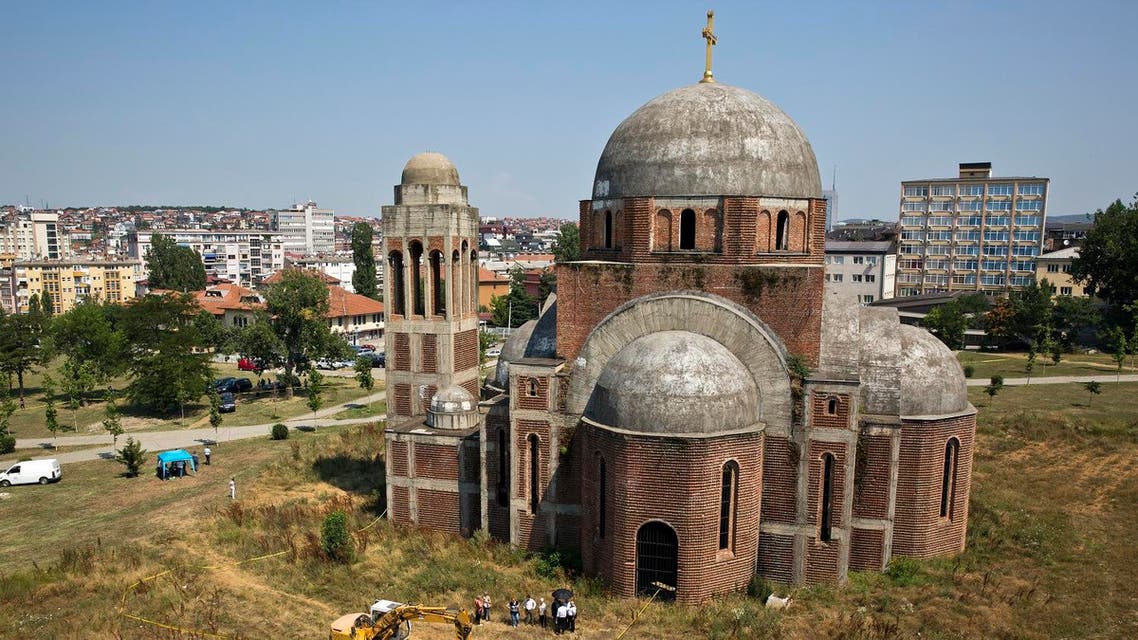 An excavator digs at a location that is being investigated at Pristina University campus following suspicions of a mass grave of people missing since the 1999 war (File Photo: AP/Visar Kryeziu)