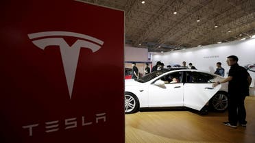Tesla said it would update Autopilot to make it difficult for drivers to ignore warnings to keep hands on the wheel. (File Photo: Reuters)