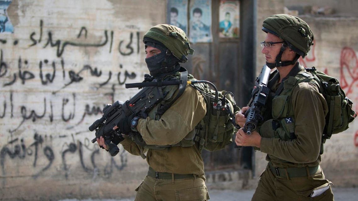 Israeli soldiers secure the scene after a Palestinian was shot and killed after he stabbed and wounded a soldier. (File Photo: AP)