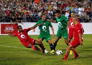 Lebanon's Fouad Hijaz, former Real Madrid player Michel Salgado, Portugal's Luis Figo of Portugal participate in a friendly soccer match between International and Lebanese football stars in an event called the Game of Legends in Beirut, Lebanon September 10, 2016. REUTERS