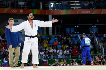 Lebanon's Nacif Elias, white, reacts after disqualified against Argentina's Emmanuel Lucenti during the men's 81-kg judo competition at at the 2016 Summer Olympics in Rio de Janeiro, Brazil, Tuesday, Aug. 9, 2016. (AP)