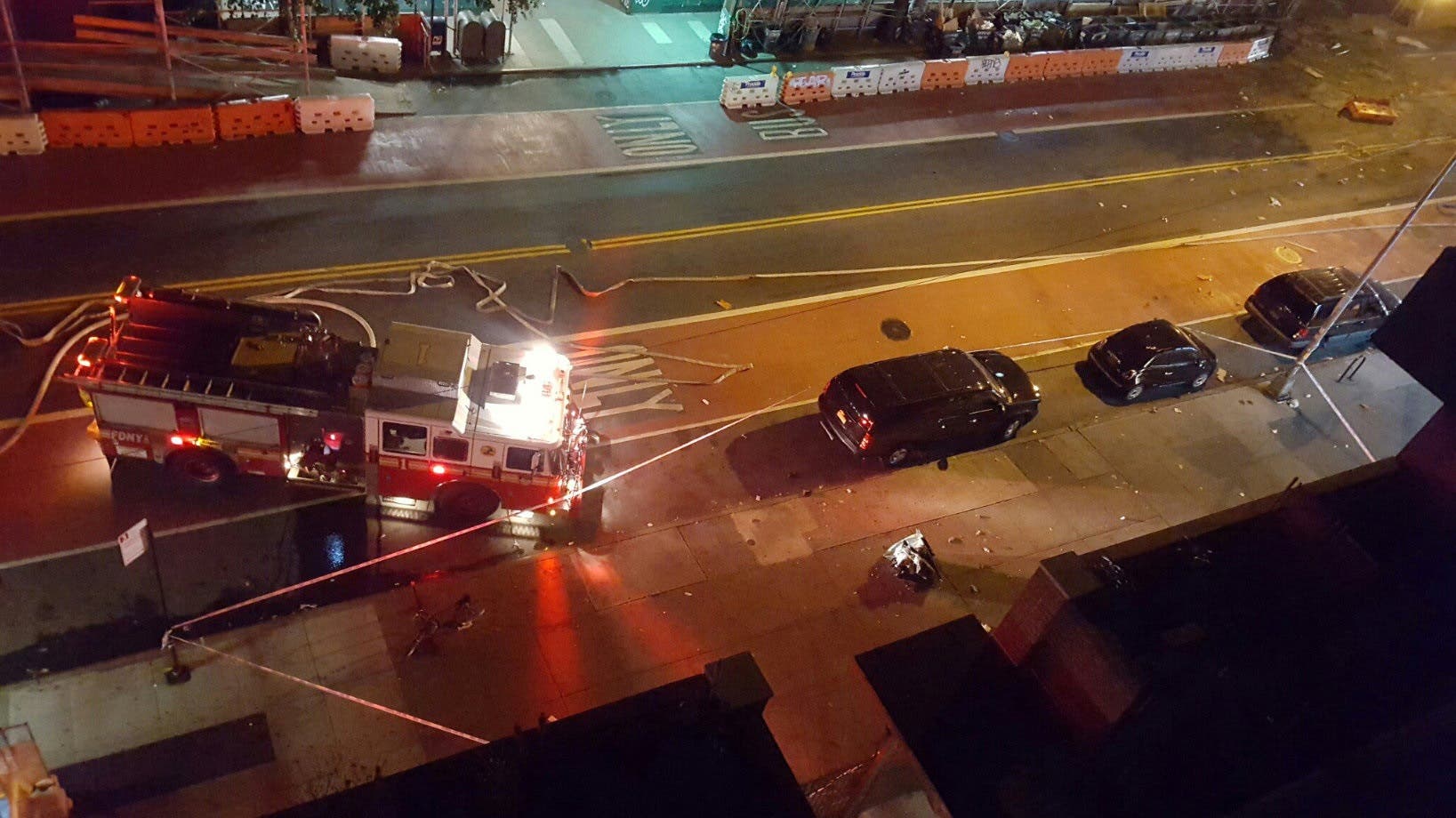 Fire rescue crews block off the street near the scene of an explosion in the Chelsea neighbourhood of New York, U.S. in this September 17, 2016 handout photo obtained via Twitter. Neha Jain via Twitter/Handout via REUTERS