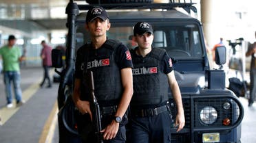 Members of Turkish special security force stand at the entrance of Ataturk Airport in Istanbul, Thursday, June 30, 2016. AP