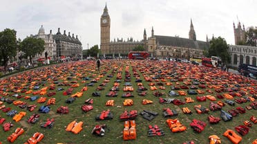 reuters A display of lifejackets worn by refugees during their crossing from Turkey to the Greek island of Chois, are seen Parliament Square in central Londo