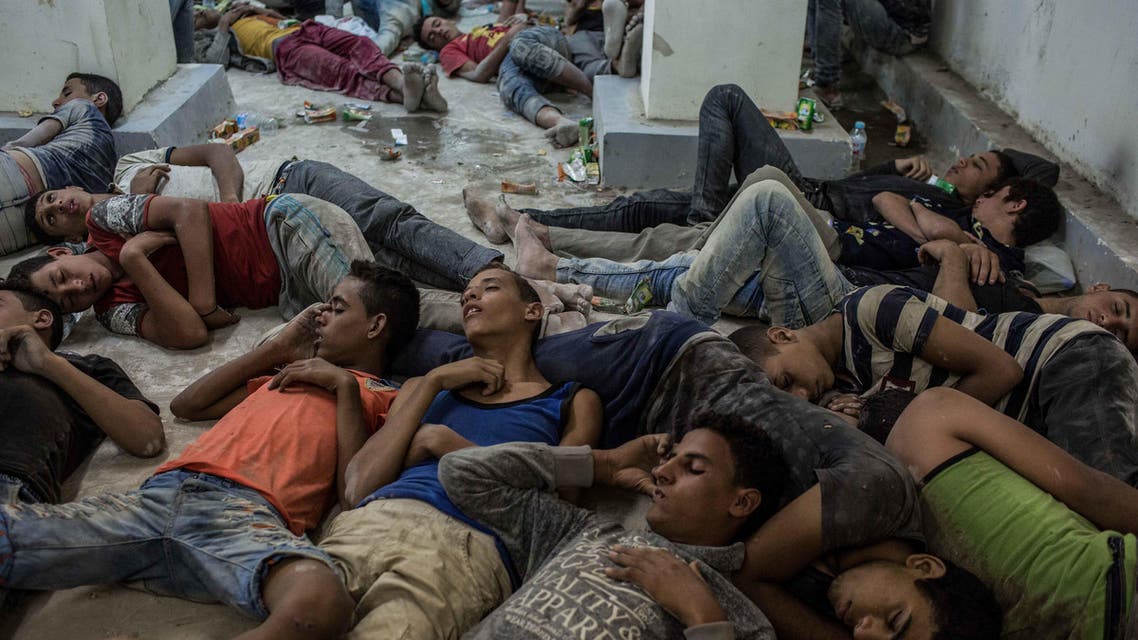Young Egyptians detained at a police station sleep on the floor in Rosetta, Egypt, after rescued from a boat capsized off the Mediterranean coast near the Egyptian city of Alexandria, Wednesday, Sept. 21, 2016.(AP)