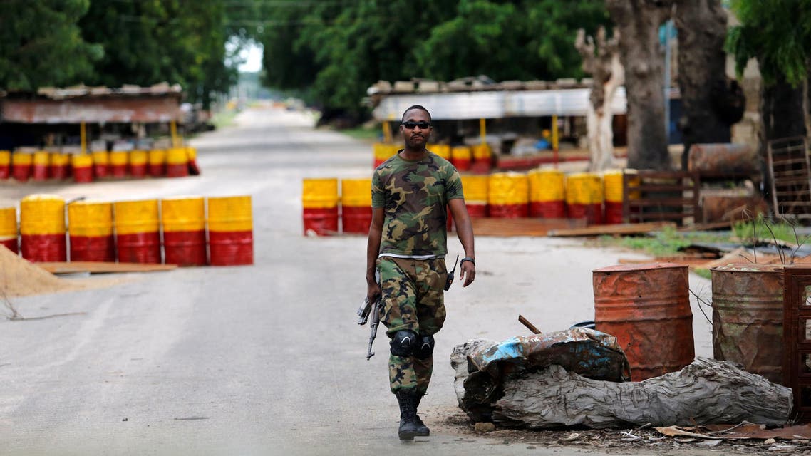 A soldier walks past a checkpoint in Bama, Borno State, Nigeria, August 31, 2016. REUTERS/Afolabi Sotunde