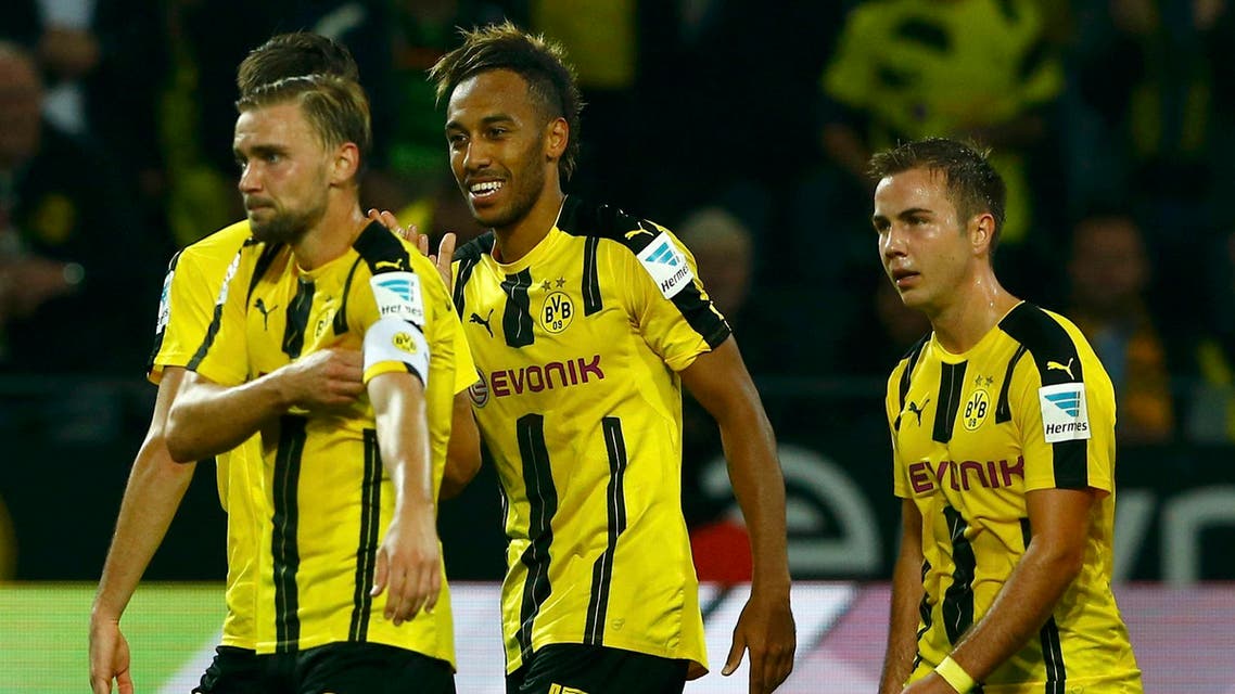 Signal Iduna Park, Dortmund, Germany - 23/09/16 Aubameyang (#17) of Borussia Dortmund celebrates goal against SC Freiburg with team. Reuters