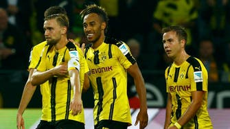 Dortmund beat Freiburg 3-1 to join Bayern on