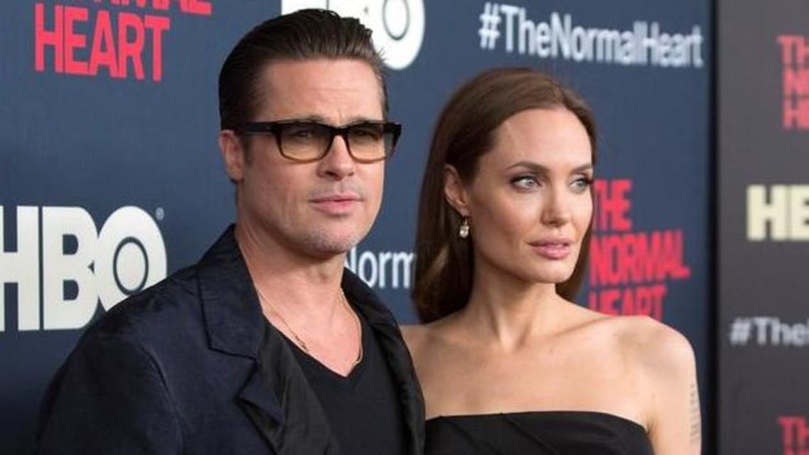 Actors Brad Pitt and Angelina Jolie attend the premiere of "The Normal Heart" in New York May 12, 2014. REUTERS/Andrew Kelly/File Photo
