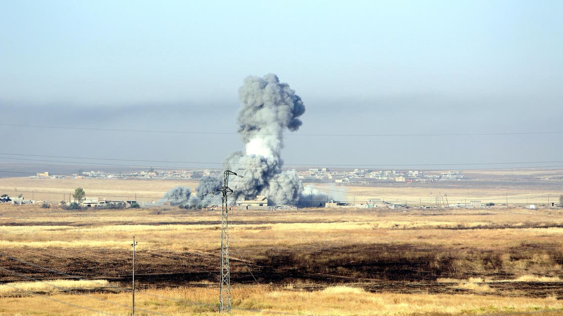 Smoke rises after airstrikes from the U.S.-led coalition against Islamic State militants in a village east of Mosul, Iraq, May 29, 2016. REUTERS