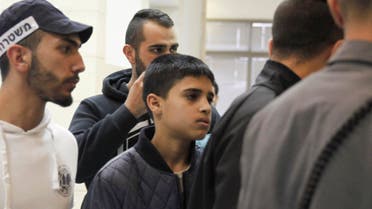 Ahmed Manasra, a 13-year-old Palestinian is brought to a court in Jerusalem, Tuesday Nov. 10, 2015. AP 