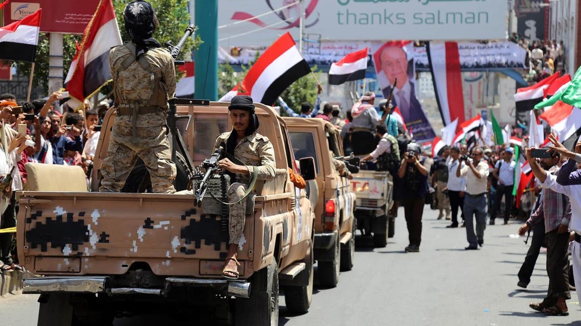 Yemeni pro-government forces, loyal to President Abedrabbo Mansour Hadi, take part in a parade to mark the anniversary of the 1962 revolution. (AFP)