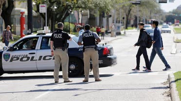 Houston Police secure streets surround The University of Houston before a Republican presidential primary debate, Thursday, Feb. 25, 2016, in Houston. (AP)