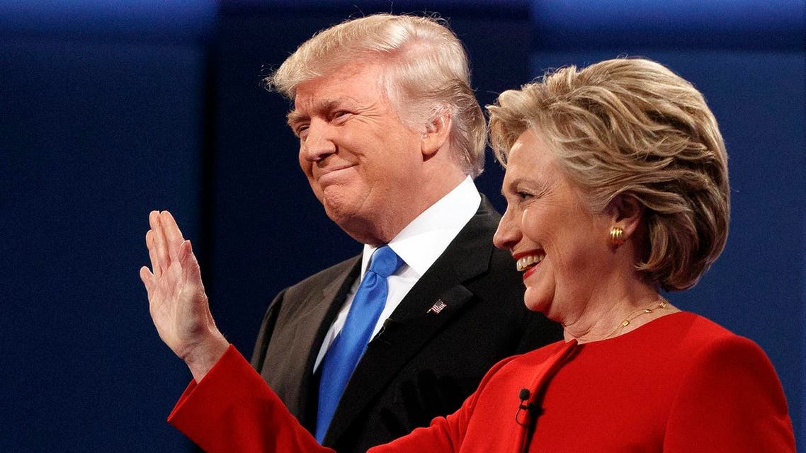 Republican presidential candidate Donald Trump, left, stands with Democratic presidential candidate Hillary Clinton at the first presidential debate at Hofstra University, Monday, Sept. 26, 2016, in Hempstead, N.Y. (AP Photo/ Evan Vucci)
