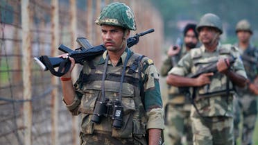 Indian Border Security Force soldiers patrol the India-Pakistan border area at Ranbir Singh Pura, about 35 kilometers from Jammu, India, Saturday, Sept. 24, 2016. (AP)