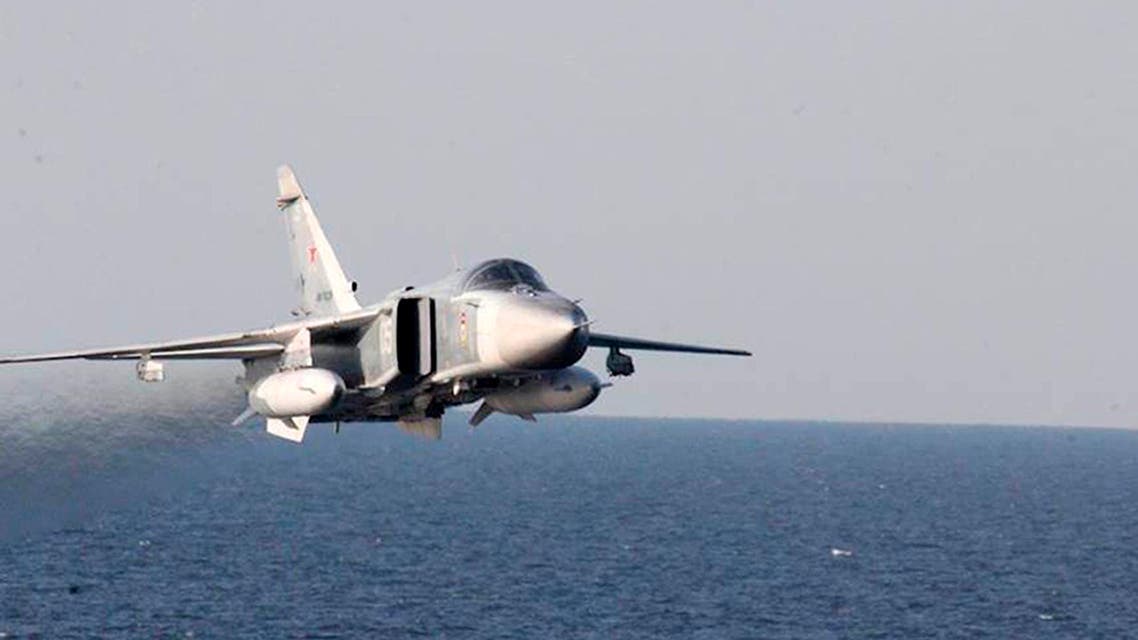 In this Tuesday, April 12, 2016 file photo provided by the U.S. Navy, a Russian Sukhoi Su-24 attack aircraft makes a low altitude pass by the USS Donald Cook in the Baltic Sea. AP