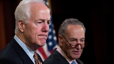 L to R, Sen. John Cornyn (R-TX) and Sen. Chuck Schumer (D-NY) take questions during a news conference concerning the Justice Against Sponsors of Terrorism Act (JASTA), on Capitol Hill, May 17, 2016, in Washington, DC. (AFP)