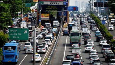 A general view shows traffic commuting on a congested road in Jakarta on June 2, 2016. (AFP)