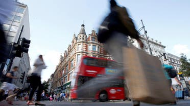 Shoppers cross the road in Oxford Street, in London, Britain August 14, 2016. Reuters