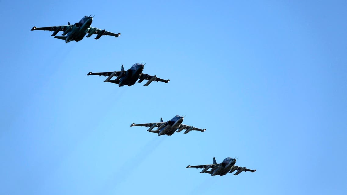 Russian Su-25 ground attack jets prepare to land after return from Syria at a Russian air base in Primorsko-Akhtarsk, southern Russia, Wednesday, March 16, 2016. AP