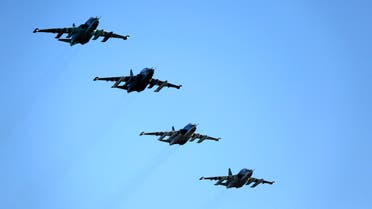 Russian Su-25 ground attack jets prepare to land after return from Syria at a Russian air base in Primorsko-Akhtarsk, southern Russia, Wednesday, March 16, 2016. AP