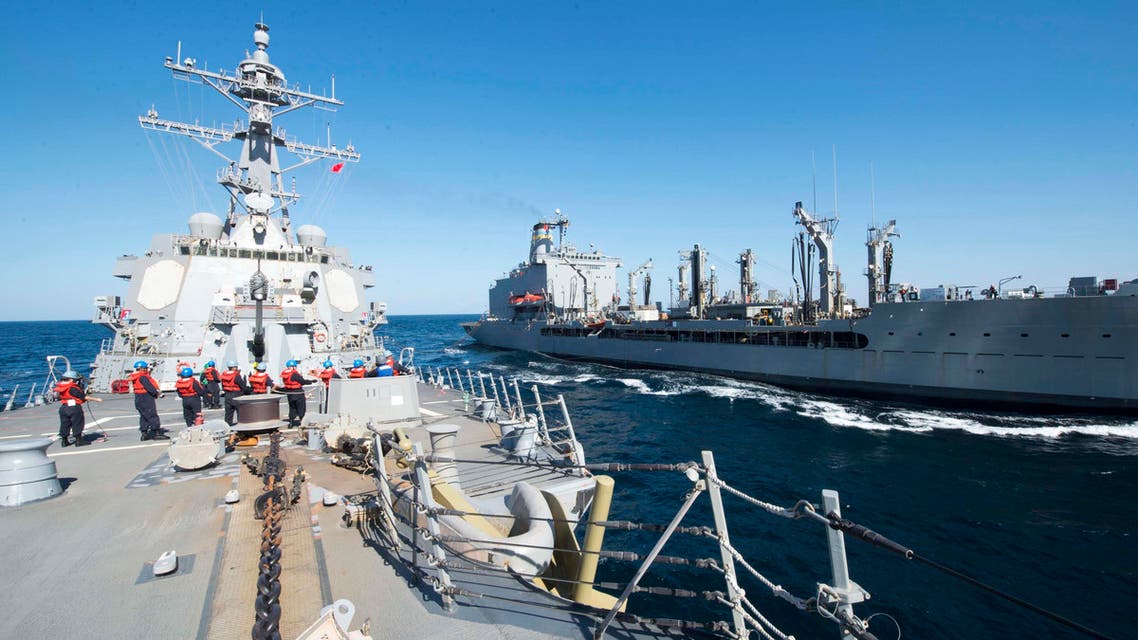 In this Thursday, Dec. 24, 2015 photo released by the U.S. Navy, guided-missile destroyer USS Bulkeley participates in a replenishment-at-sea with fleet replenishment oiler USNS John Lenthall in the Gulf of Oman. (AP)