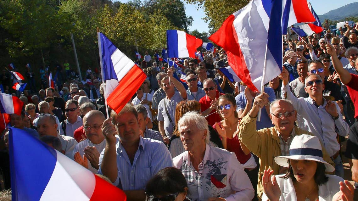 Supporters of far right National Front party attend a rally in Pierrefeu, southeastern France, Saturday, Oct. 8, 2016 (Photo: AP/Philippe Farjon)