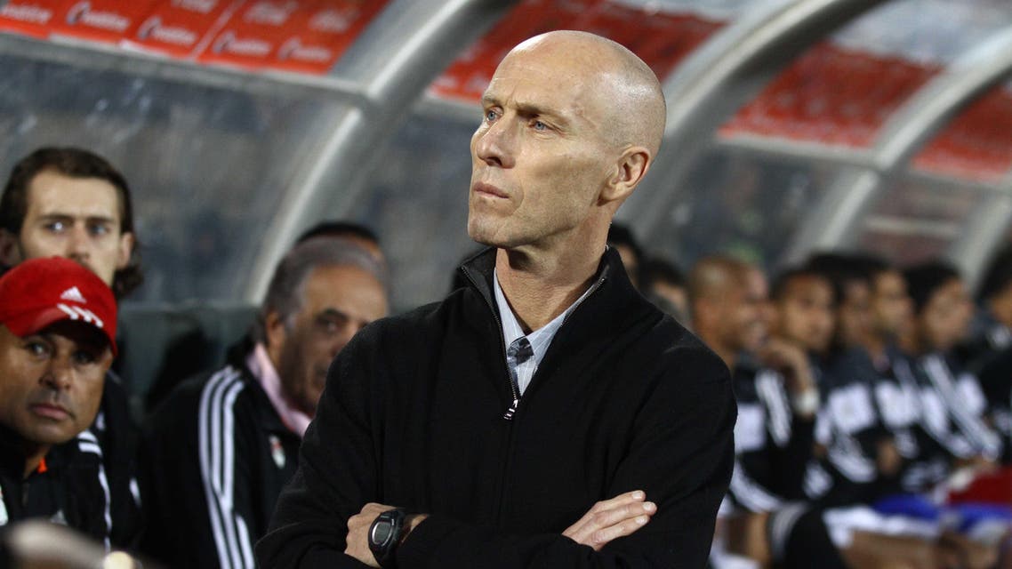 American Bob Bradley, the head coach of Egypt's national soccer team, watches during the World Cup qualifying playoff second leg soccer match between Ghana and Egypt, at the Air Defense Stadium in Cairo, Egypt, Tuesday, Nov. 19, 2013. (AP)