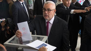 Moroccan Prime Minister and Secretary General of the ruling Islamist Justice and Development Party (PJD), Abdelilah Benkirane, casts his vote in the parliamentary elections at a polling station in the centre of the capital Rabat on October 7, 2016. (AFP