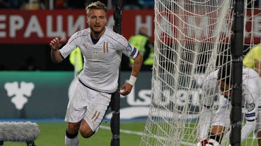 Italy’s Ciro Immobile, left, celebrates after scoring the second team's goal against Macedonia, during their World Cup Group G qualifying soccer match at the Philip II of Macedon National Stadium in Skopje, Macedonia, on Sunday, Oct. 9, 2016. (AP)