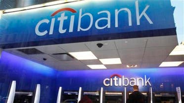 In this Jan. 6, 2012 file photo, a Citibank customer makes a transaction at an ATM, in New York. AP