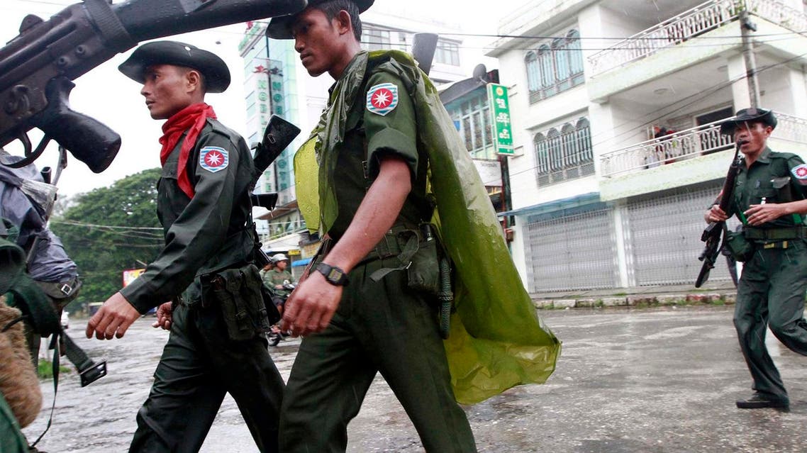 Myanmar soldiers patrol in a street in Sittwe, capital of Rakhine state in western Myanmar, on Friday, June 15, 2012. The communal violence that swept through Rakhine over the past week killed dozens of people. (AP Photo/Khin Maung Win)
