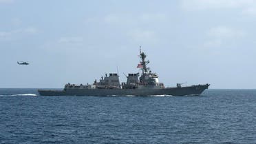 The U.S. Navy guided-missile destroyer USS Mason conducts divisional tactic maneuvers in the Gulf of Oman. (Reuters)