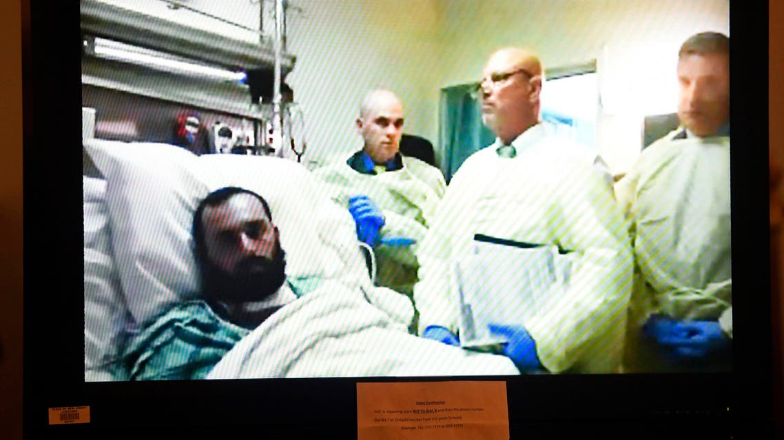 Ahmad Khan Rahimi, left, appears via video from his hospital bed in Newark, N.J., during a court hearing at the Union County Courthouse, Thursday, Oct. 13, 2016, in Elizabeth, N.J. (AP)