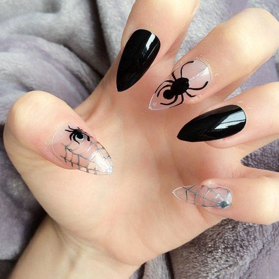 Get fierce and frightening with spooky Halloween nail art ...