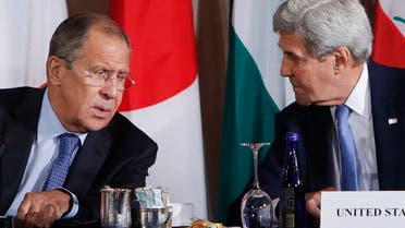 Russia's Foreign Minister Sergey Lavrov, left, and United States Secretary of State John Kerry talk during a meeting of the International Syria Support Group, Thursday, Sept. 22, 2016, in New York. AP