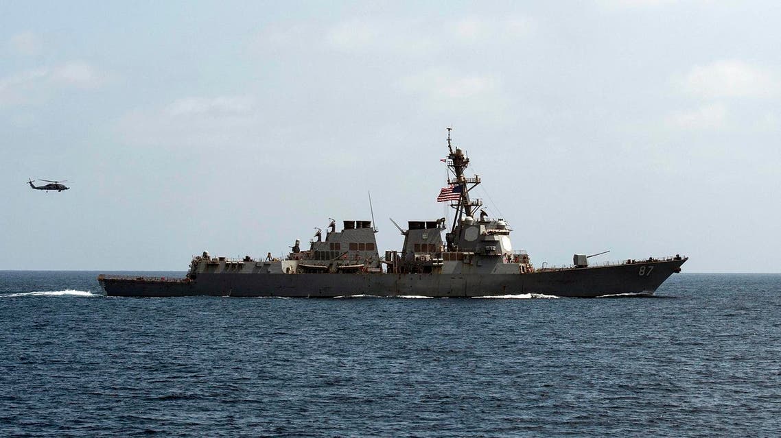 In this image released by the U.S. Navy, the USS Mason (DDG 87), conducts maneuvers as part of a exercise in the Gulf of Oman on Sept. 10, 2016. For the second time this week two missiles were fired at the USS Mason in the Red Sea, and officials believe they were launched by the same Yemen-based Houthi rebels involved in the earlier attack, a U.S. military official said Wednesday. According to the official, the missiles were fired early Oct. 12 at the USS Mason that is conducting routine operations in the region, along with the USS Ponce, an amphibious warship. The official said that neither missile got near the ship. (Mass Communication Specialist 1st Class Blake Midnight/U.S. Navy via AP)