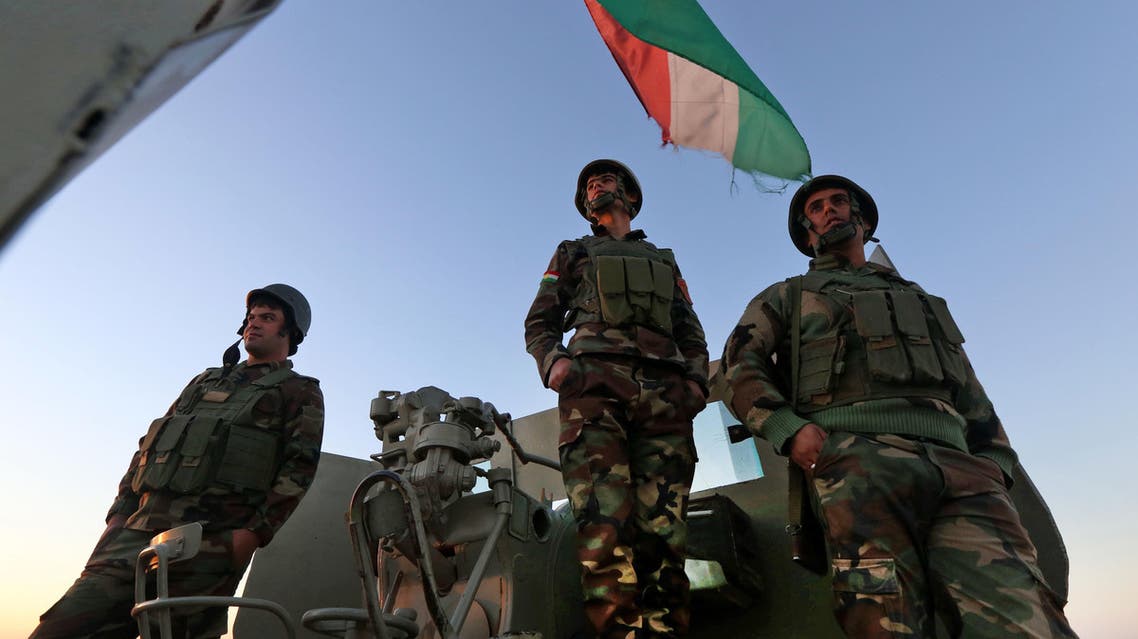 Iraqi Kurdish Peshmerga fighters hold a position on the top of Mount Zardak, about 25 kilometers east of Mosul, on October 17, 2016. (AFP)
