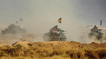 Iraqi forces deploy in the area of al-Shourah, some 45 kms south of Mosul, as they advance towards the city to retake it from the Islamic State (IS) group jihadists, on October 17, 2016. Iraqi Prime Minister Haider al-Abadi announced earlier in the day that the long-awaited operation to recapture Mosul was under way. (AFP)