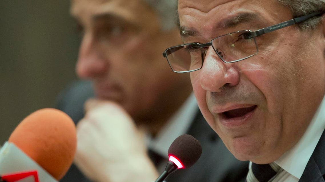 Minister of Finance Amr El-Garhy, right, and Central Bank Governor Tarek Amer speak during a press conference at the headquarters of the finance ministry in Cairo, Egypt, Thursday, Aug.11, 2016. (AP Photo/Amr Nabil)