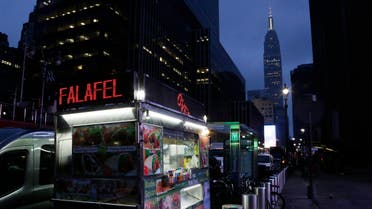 A food truck selling falafel and other halal food is shown outside Madison Square Garden, Wednesday, Feb. 10, 2016, in New York. (AP)