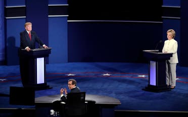 Moderator Chris Wallace, of FOX News, turns towards the audience as he questions Democratic presidential nominee Hillary Clinton and Republican presidential nominee Donald Trump during the third presidential debate at UNLV in Las Vegas, Wednesday, Oct. 19, 2016.(AP
