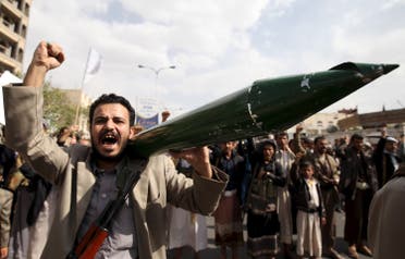 A Houthi follower carries a mock missile as he shouts slogans during a demonstration against the United Nations in Sanaa, Yemen. (File photo: Reuters)
