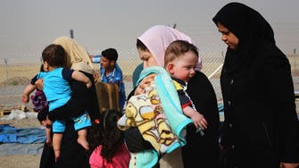 Thousands of Iraqis flee Mosul to Syria