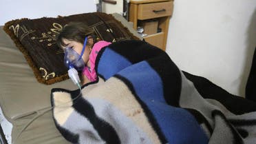 A girl, affected by what activists say was a gas attack, receives treatment inside a makeshift hospital in Kfar Zeita village in the central province of Hama May 22, 2014. (Reuters)